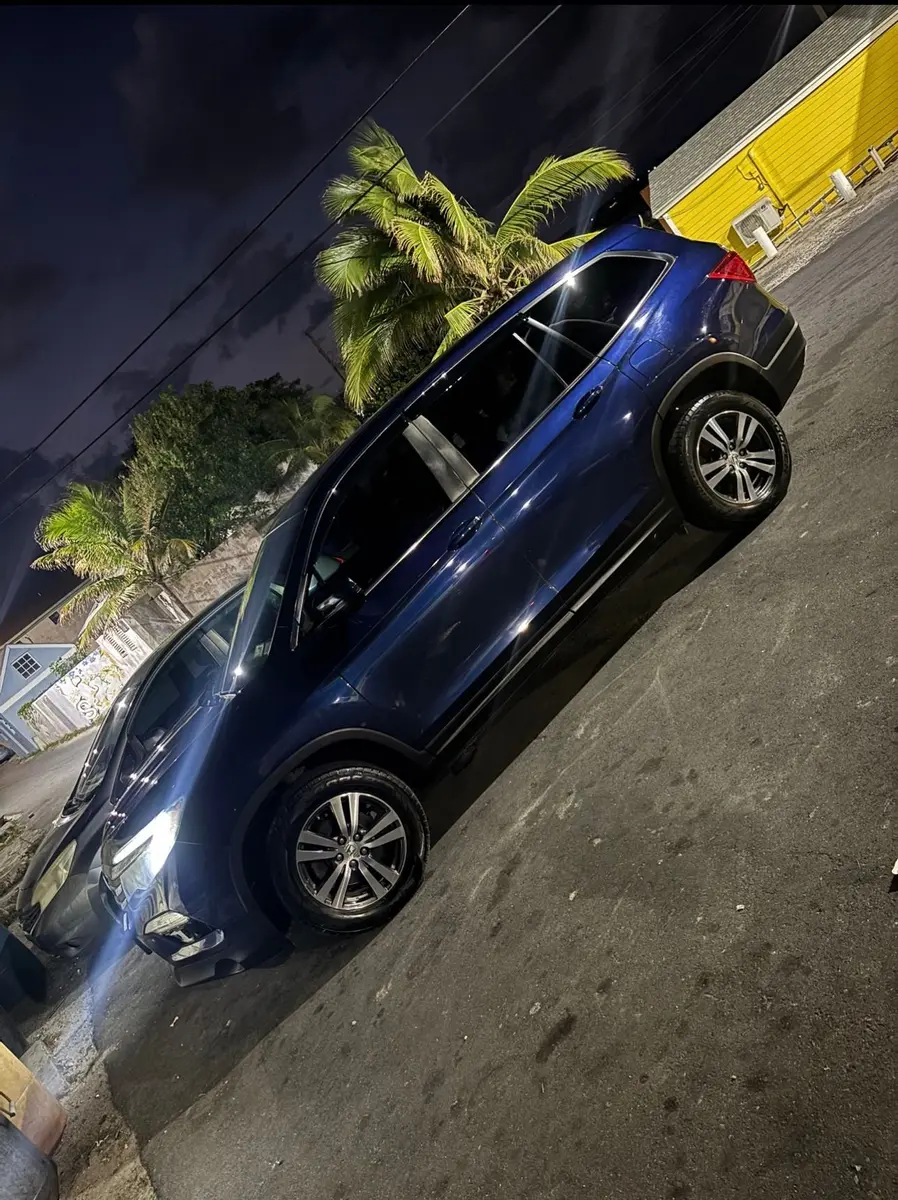 Honda Pilot photographed at night by Tyler Car Rentals